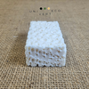 Nous avons choisi de vous présenter les pains de savons exfoliants et raffermissants de Label Provence Nature au lait d'ânesse BIO, poudre de riz et son de blé.
Particulièrement riche en lait d'ânesse, ce savon est de grande qualité et apportera un soin complet à votre peau en l'adoucissant et en l'hydratant. Un gommage naturel pour une peau ravivée et tonifiée.
Le lait d'ânesse possède des vertus nourrissantes, revitalisantes, régénérantes et fortifiantes. Il apporte à votre peau douceur et bien-être.